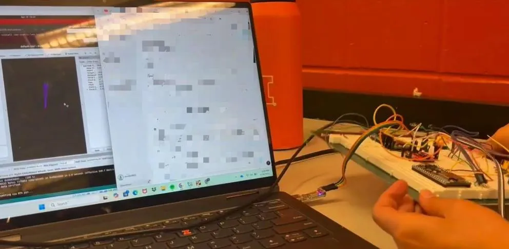 Ground station laptop showing live pose in RViz next to the glove electronics.