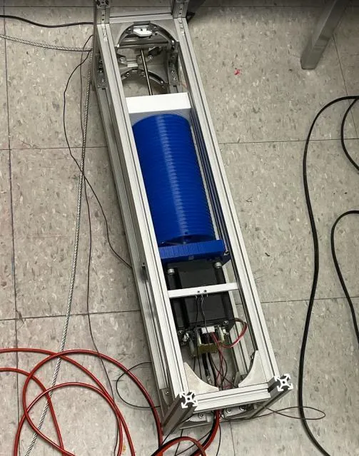 Winch module on the bench, wired for testing.